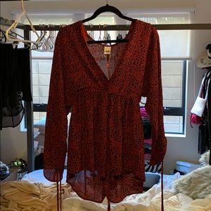 Brand new never worn leopard long sleeve romper